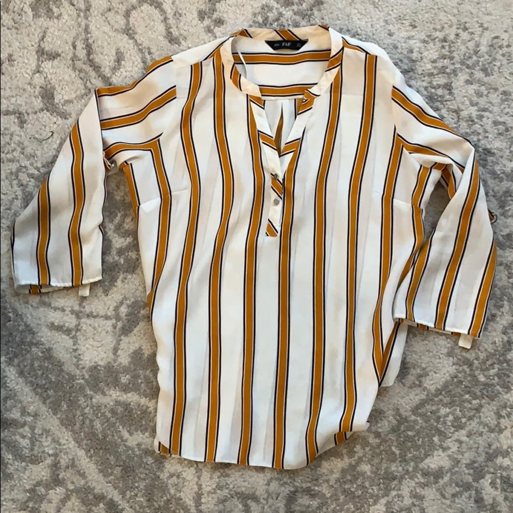 White and yellow striped blouse